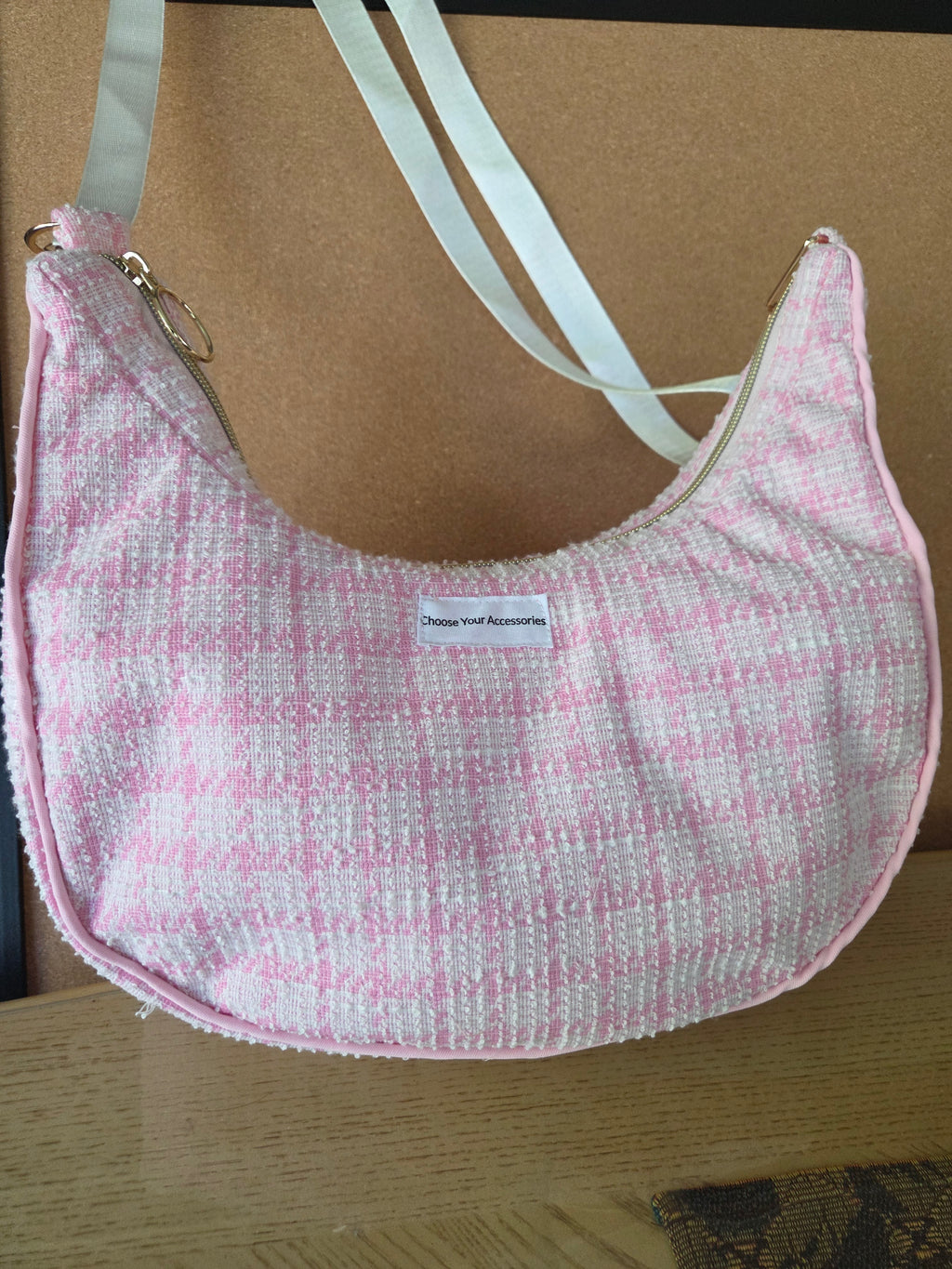 Handmade pink textured shoulder bag.
