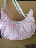 Handmade pink textured shoulder bag.