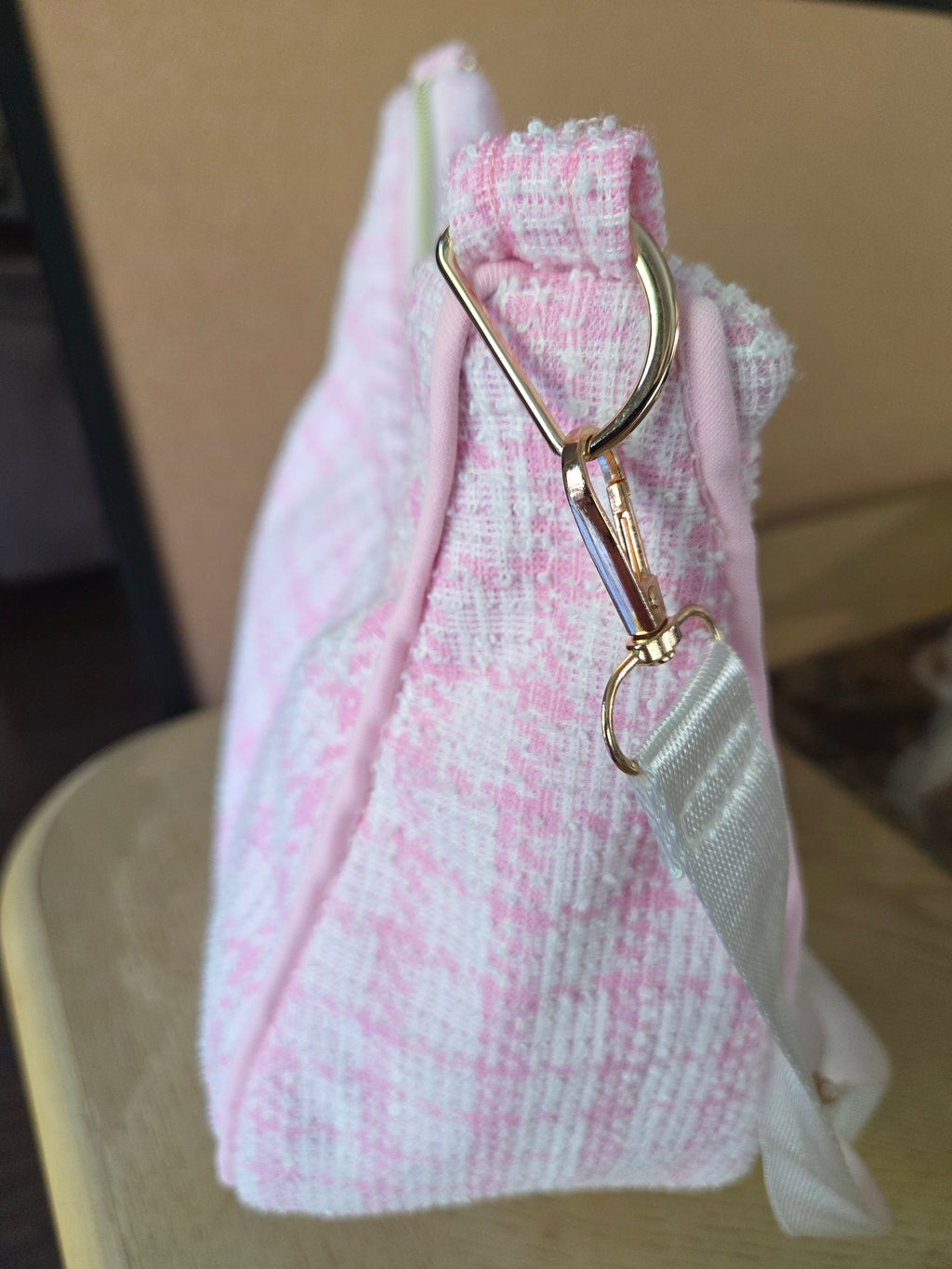 Handmade pink textured shoulder bag.