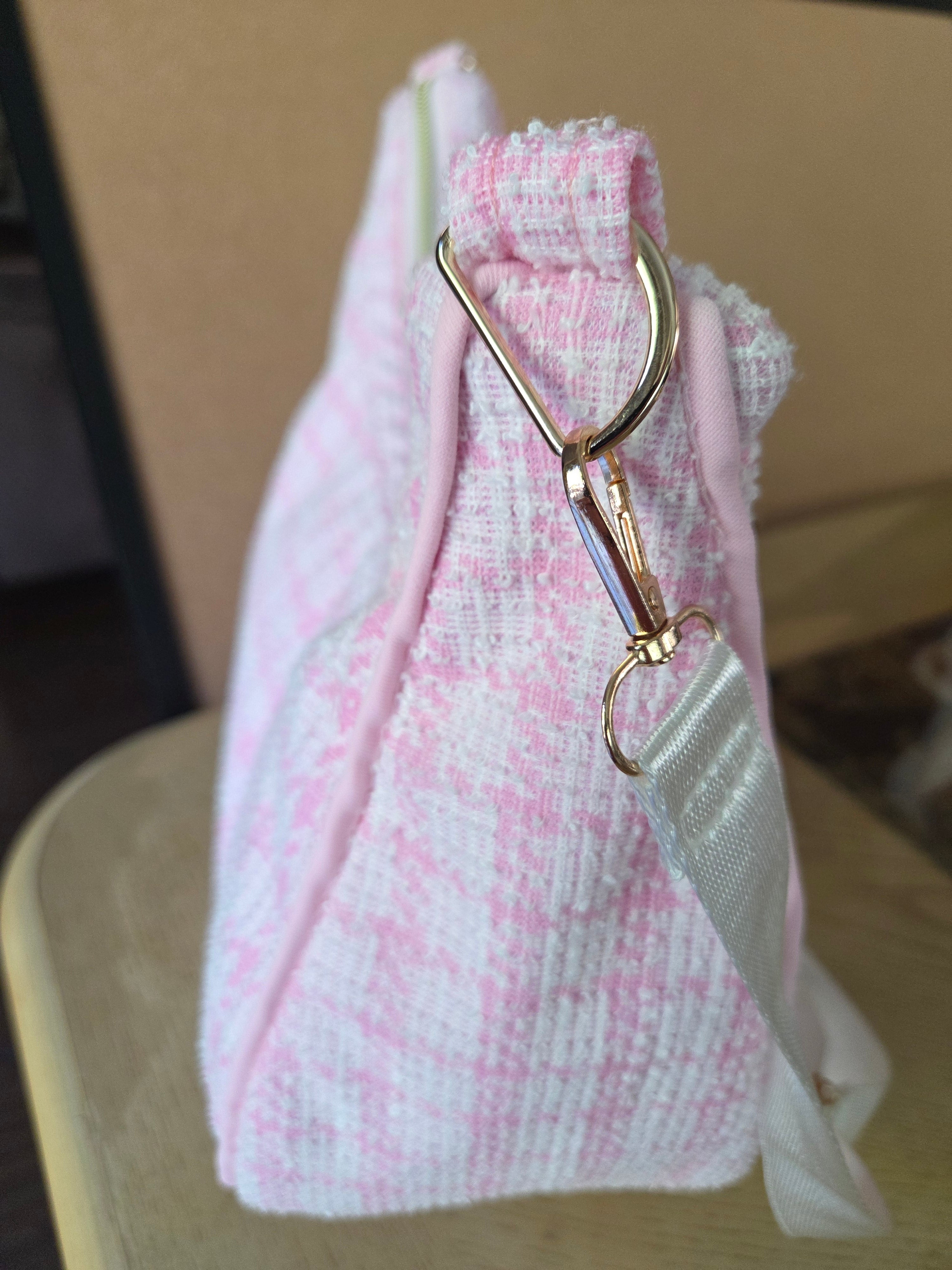 Handmade pink textured shoulder bag.