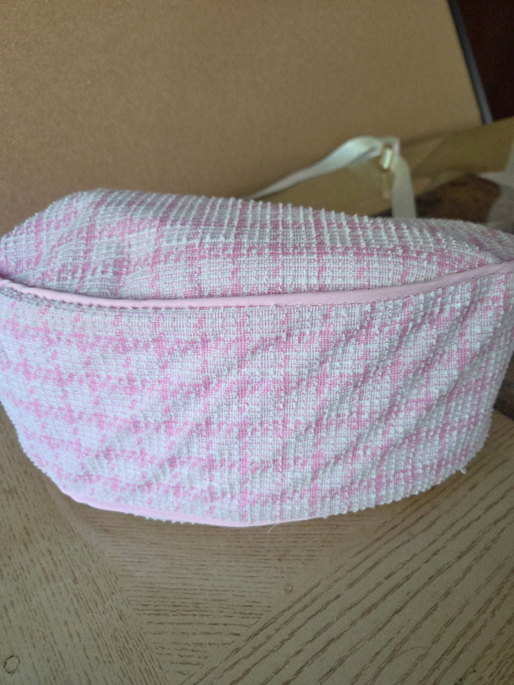 Handmade pink textured shoulder bag.