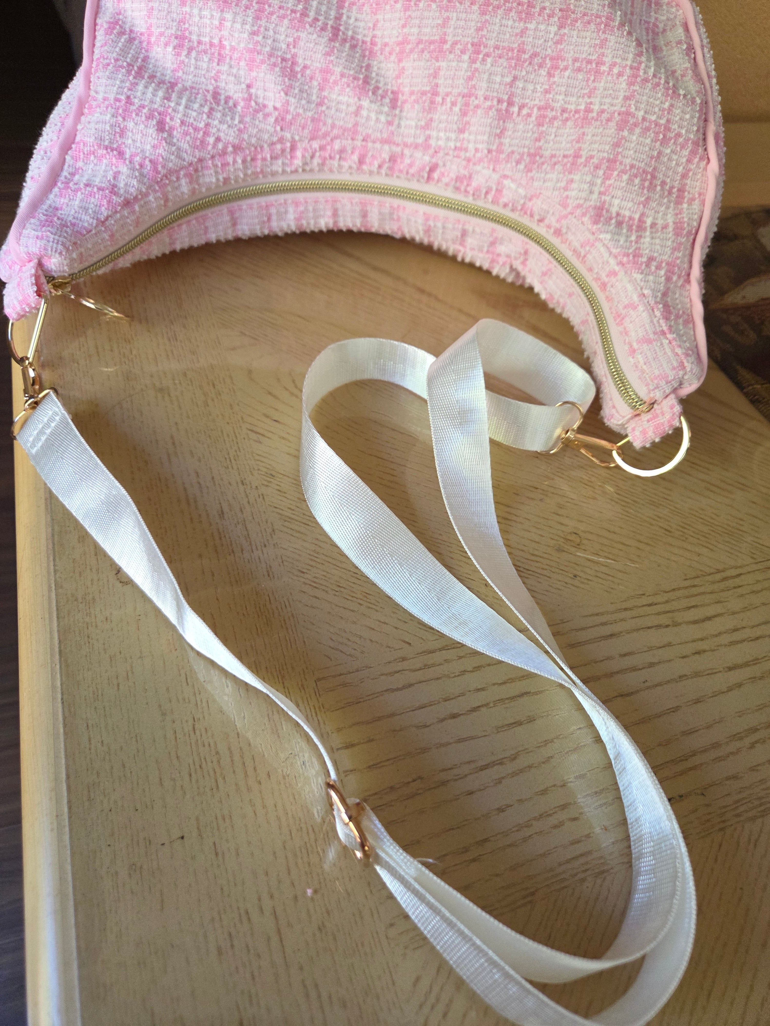 Handmade pink textured shoulder bag.