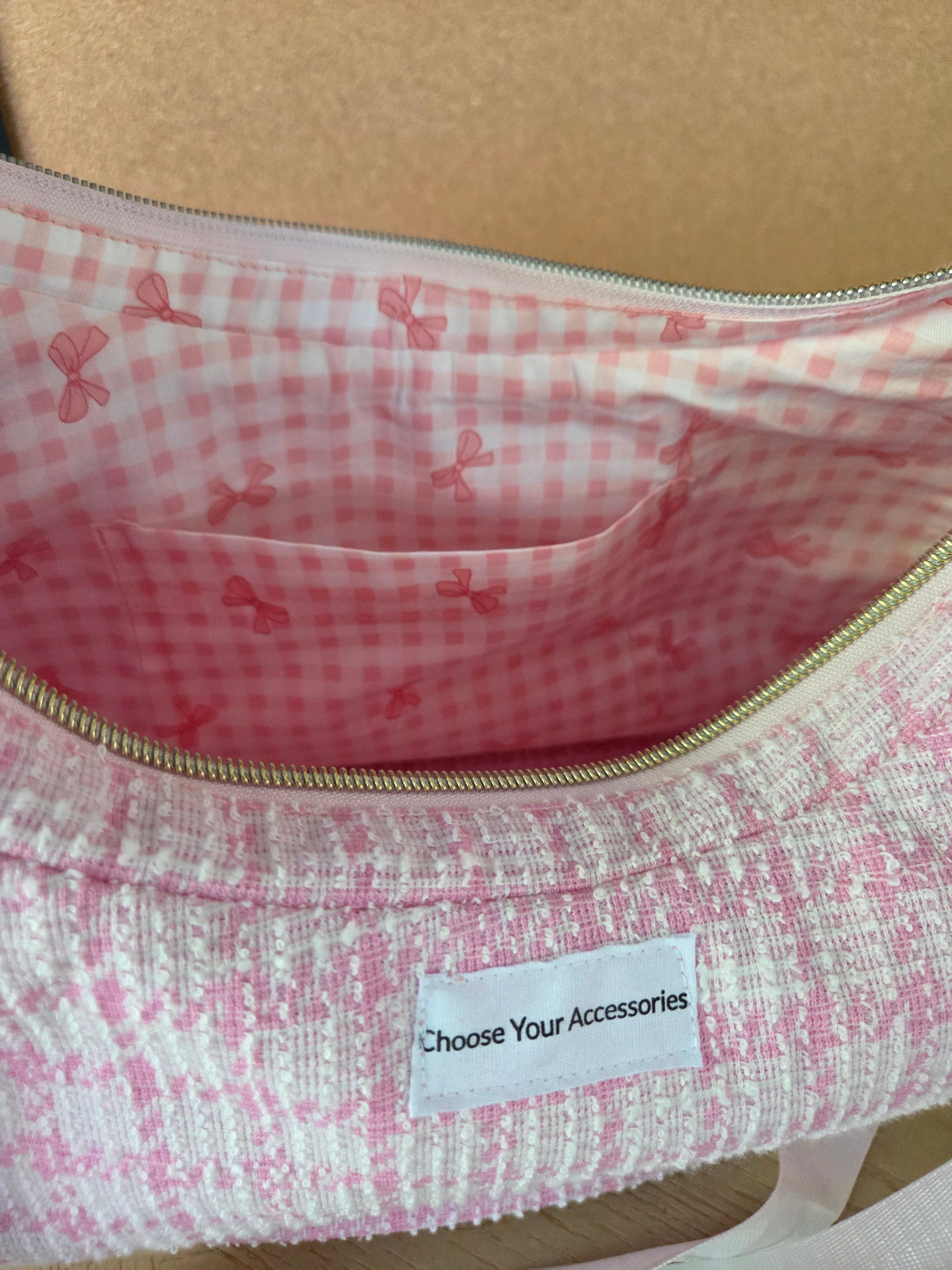 Handmade pink textured shoulder bag.