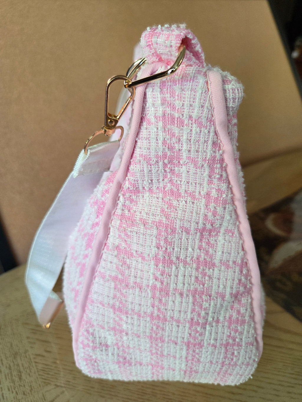 Handmade pink textured shoulder bag.