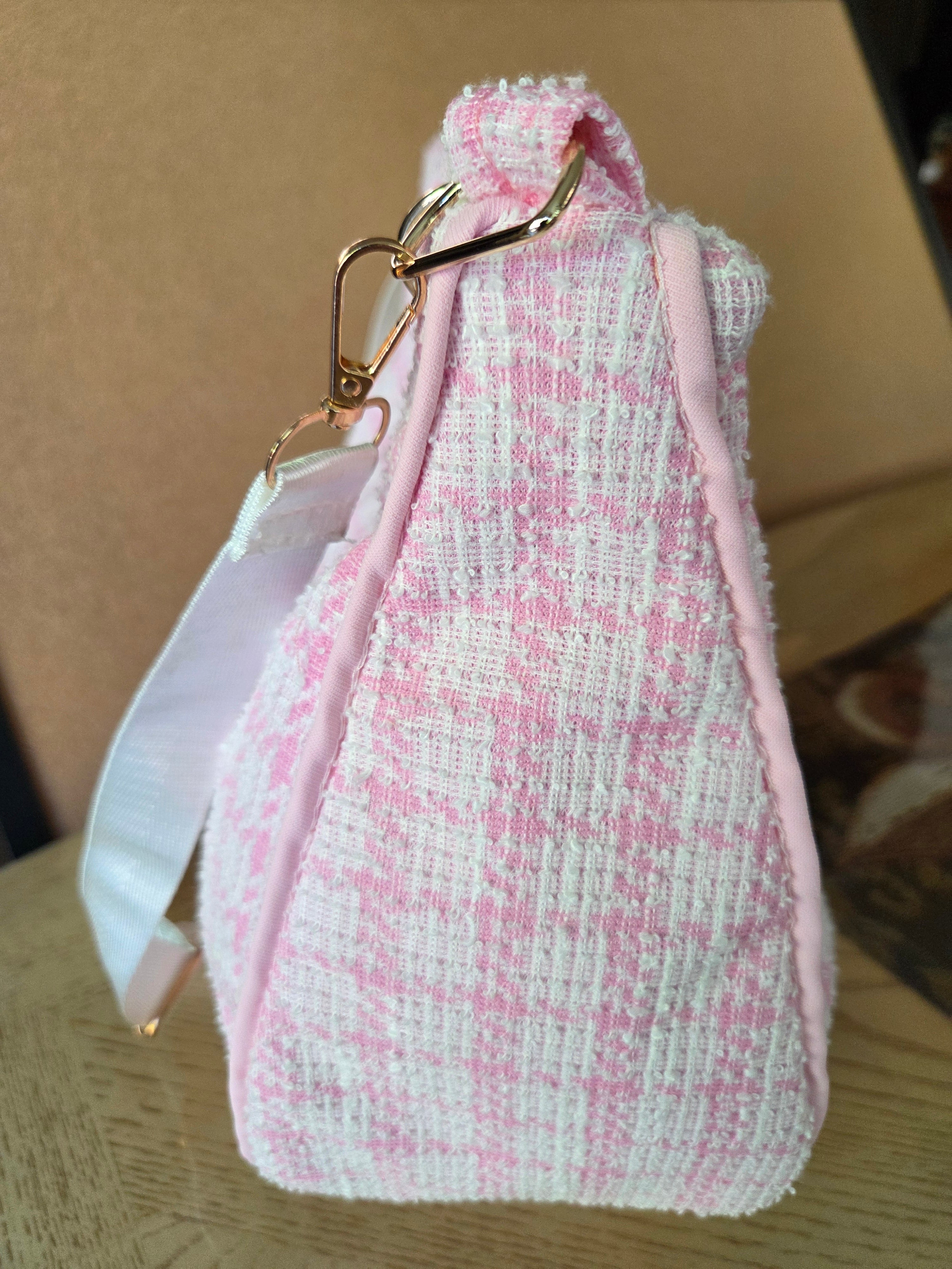Handmade pink textured shoulder bag.